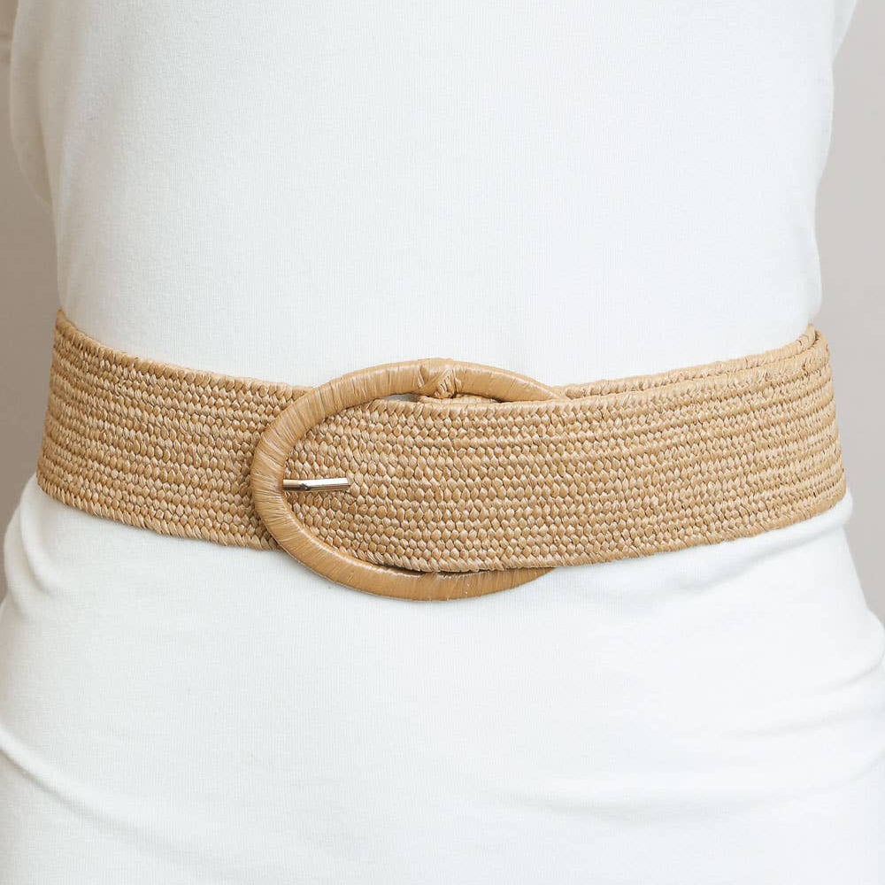 Beige woven belt with a large buckle on a white background