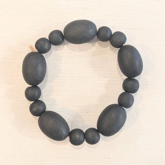 Black Distressed Wood Oval Bead Candle Ring