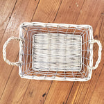 Wire basket with wicker handles