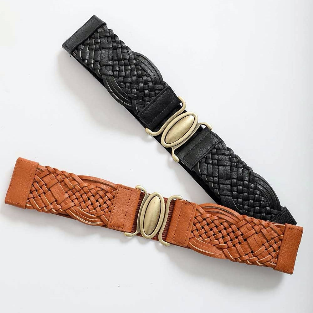 Two woven belts, one black and one brown, with gold buckles on a white background.